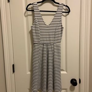 Black and white open back dress.